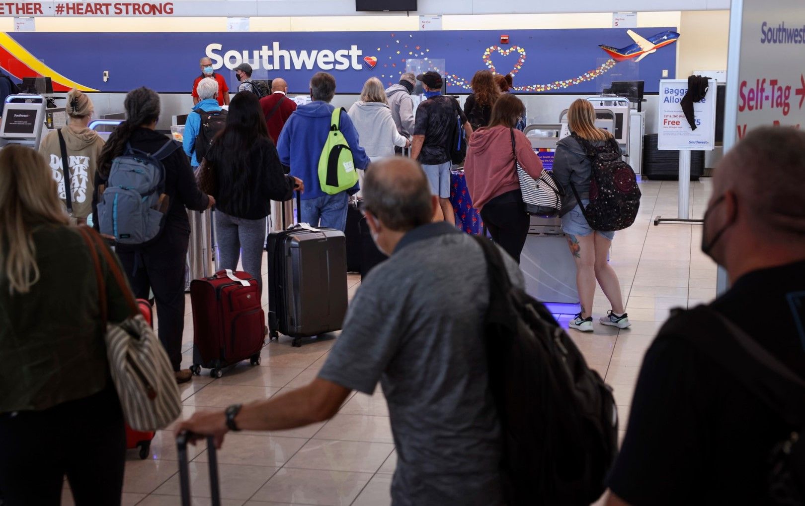 Southwest cancels hundreds more flights, denies vaccine mandate protest