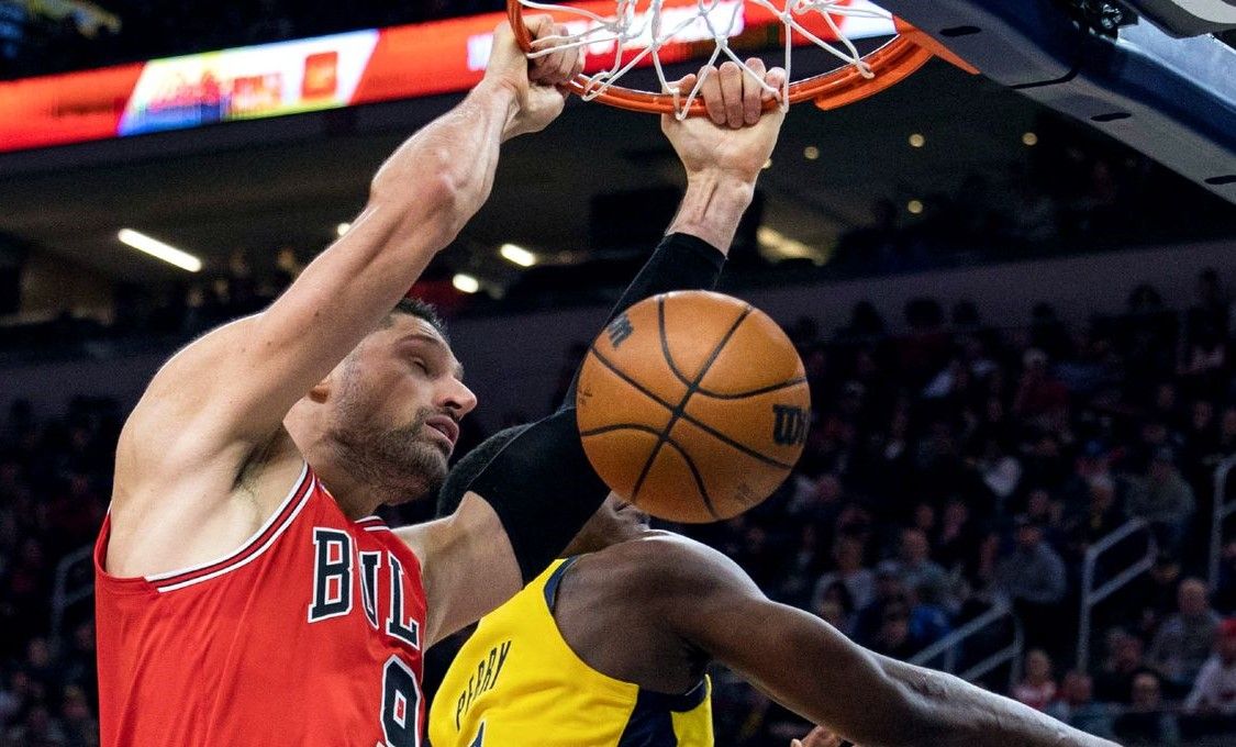 Bulls use late charge to put away Pacers 122-115