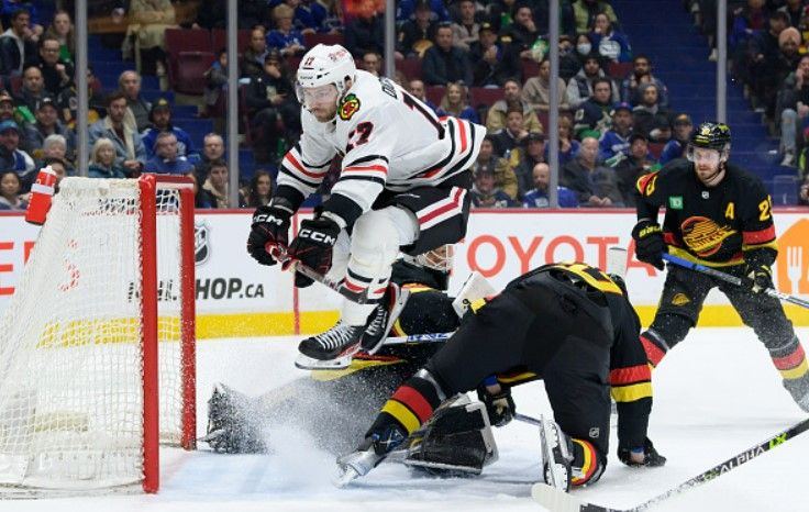 Canucks beat Blackhawks 5-2 in Tocchet's debut as coach