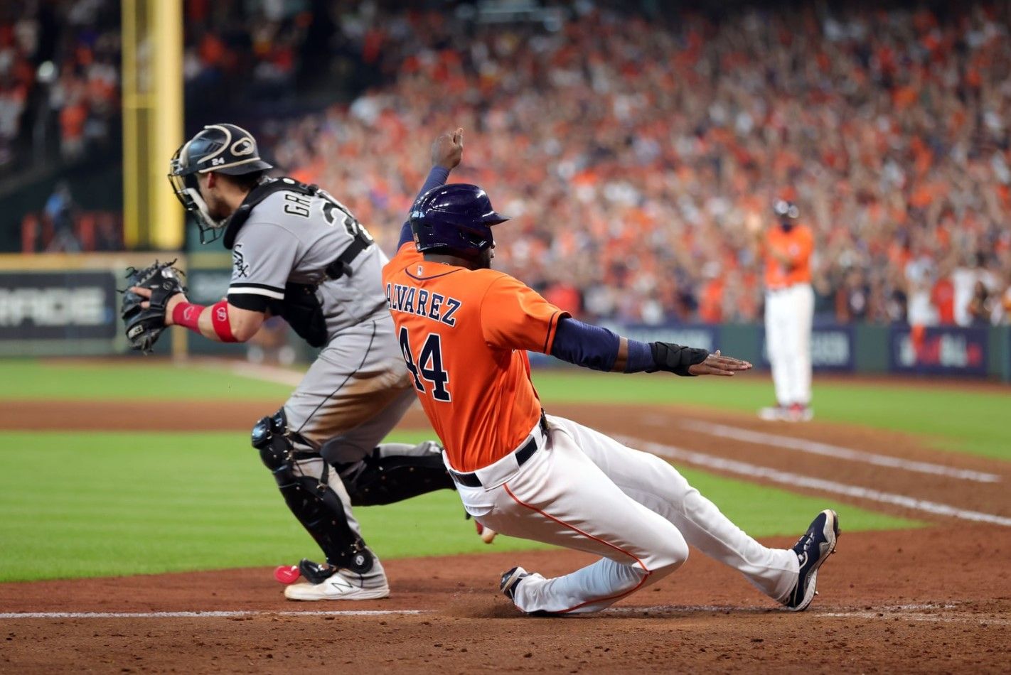 Correa, Alvarez help Astros take 2-0 lead over Sox in ALDS