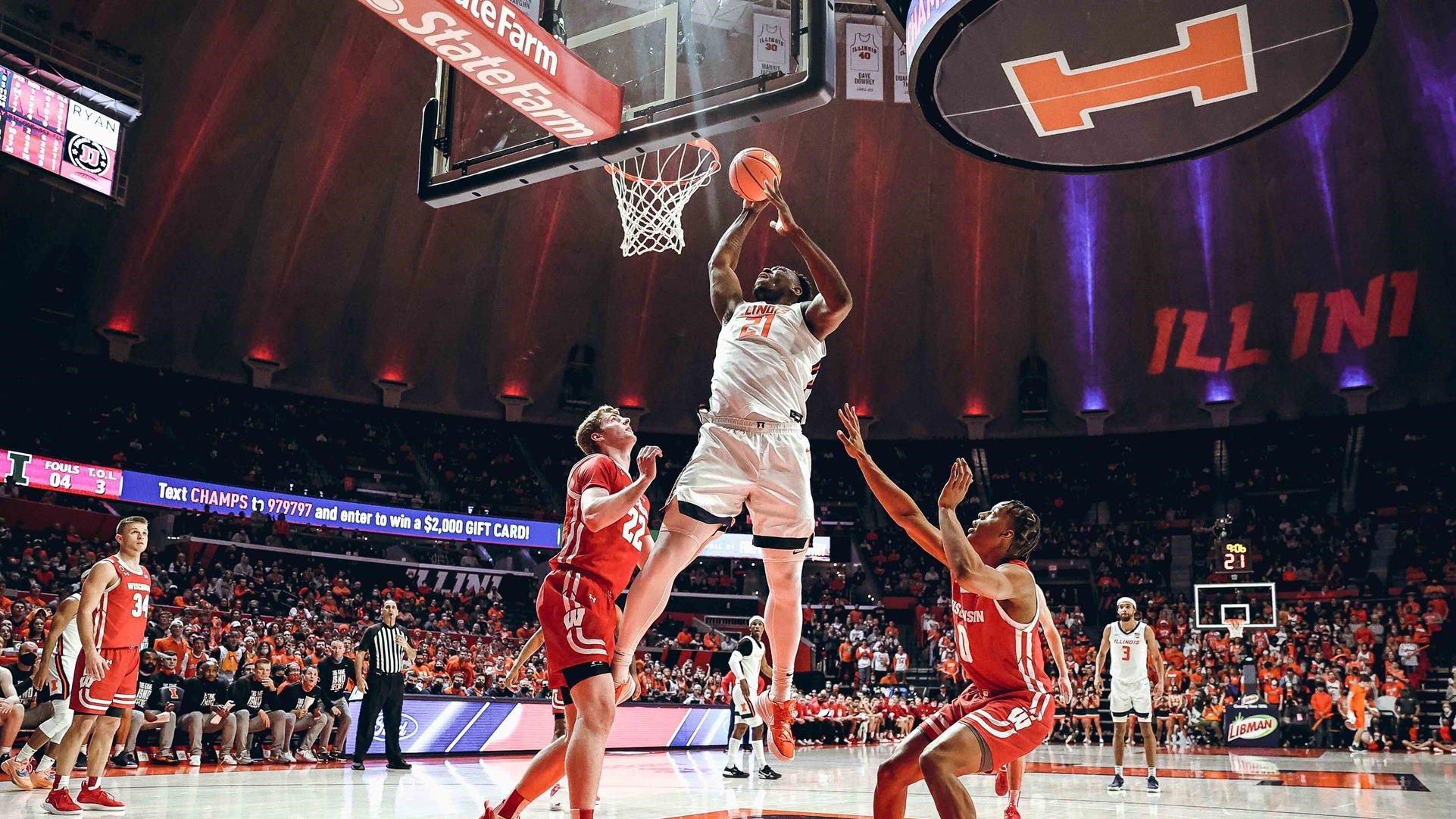 Cockburn leads No. 18 Illinois past No. 11 Wisconsin, 80-67