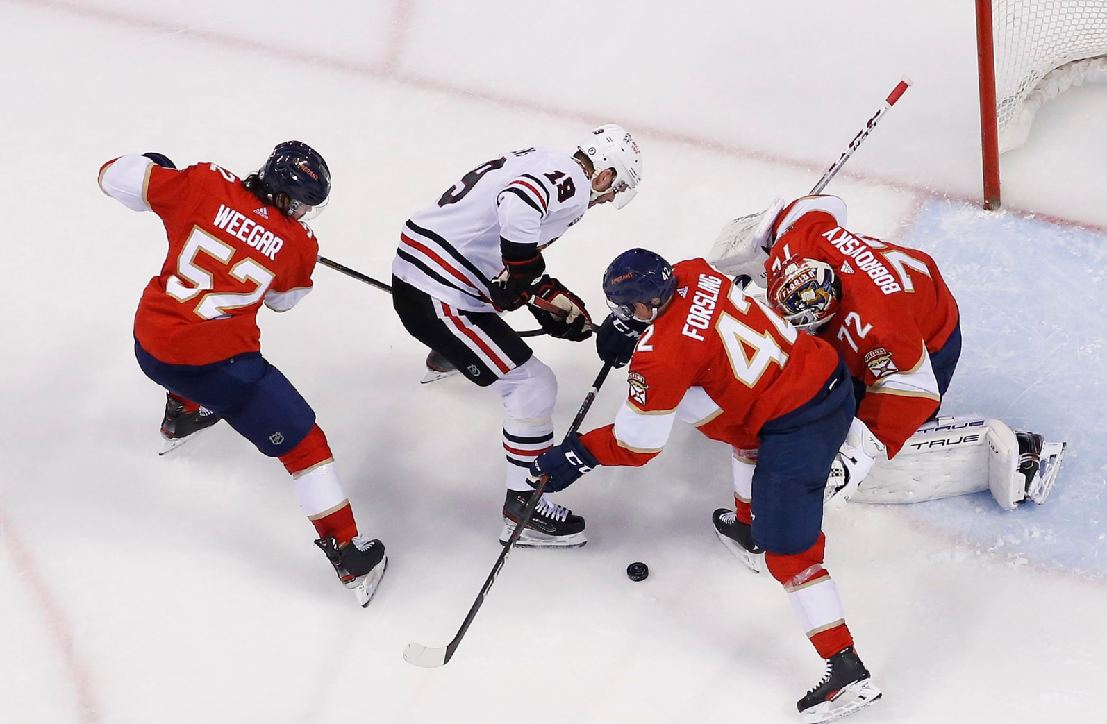 Panthers beat Blackhawks 4-0, set club record for home wins