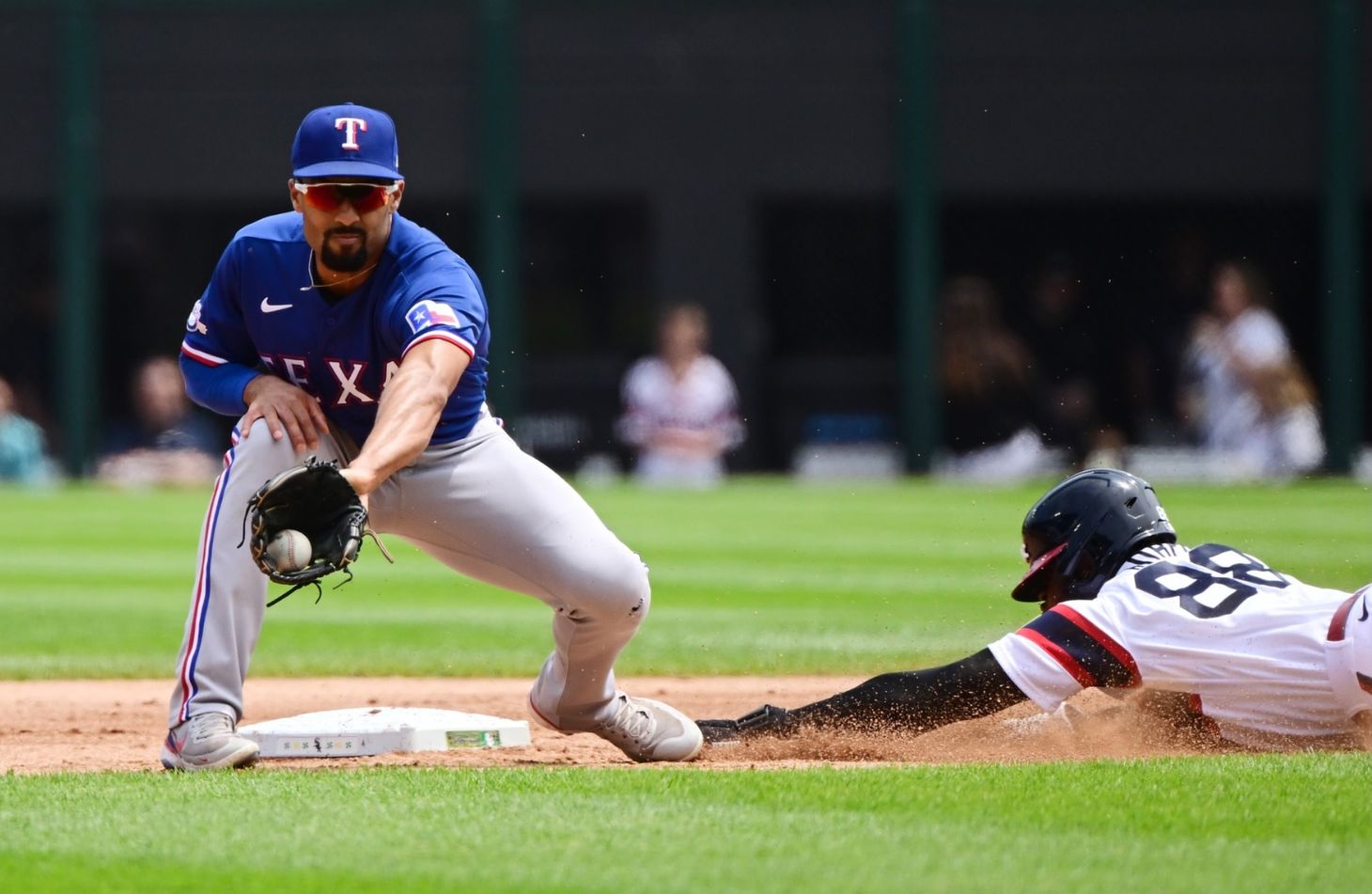 Rangers end 12-inning win over White Sox on 7-5 double play
