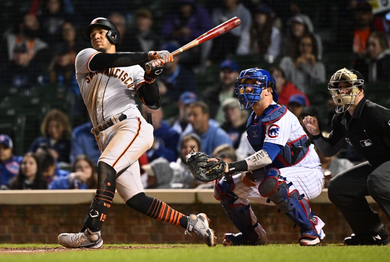 Estrada, Flores homer in late innings, Giants beat Cubs 4-2