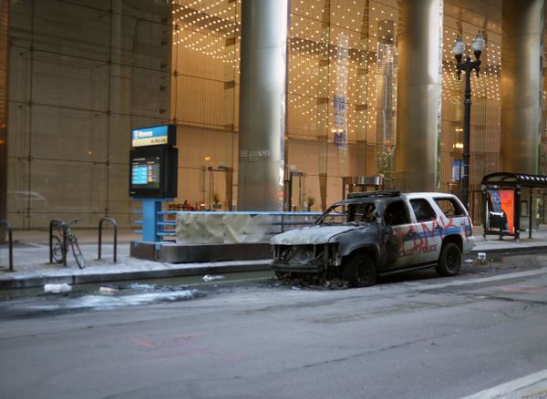 Man admits setting police SUV on fire in riot